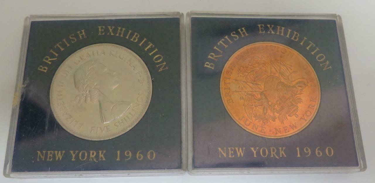 1960 British Exhibition Coins, 5 Shilling And Plated Brass Token With Cases.